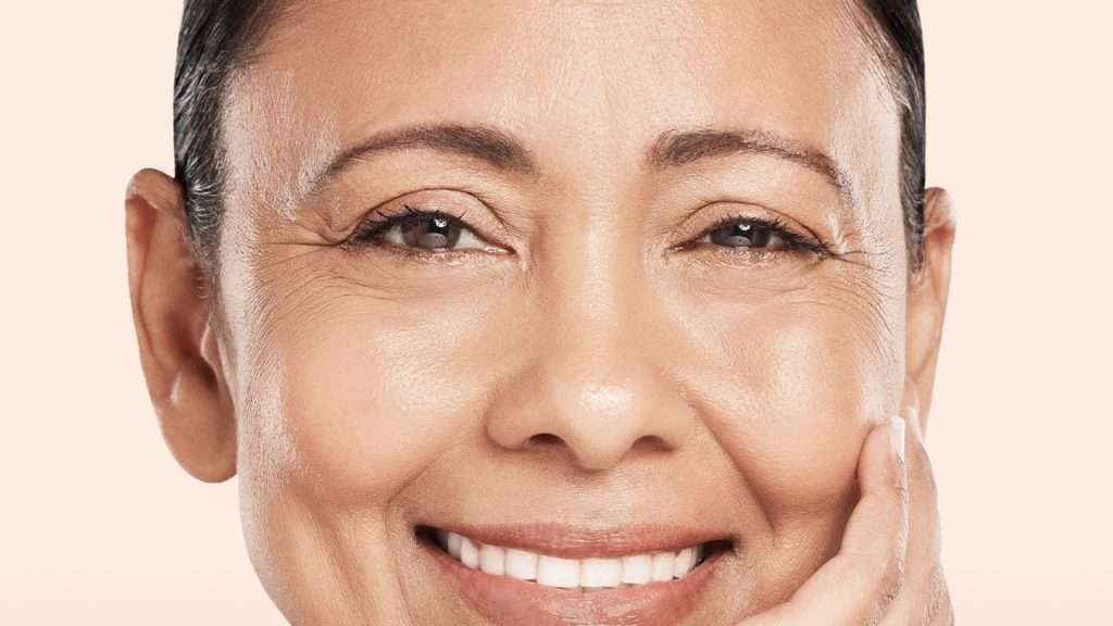 a close-up of a woman smiling