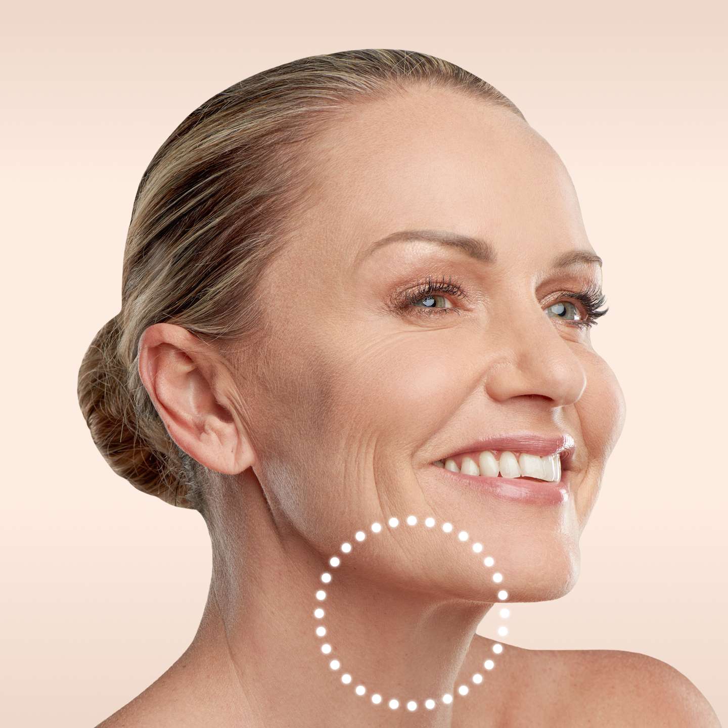 a woman smiling with a circle around her neck